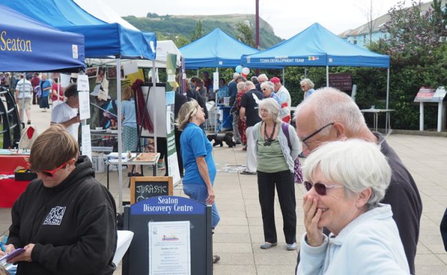 Image of Stalls and visitors of Natural Seaton Festival