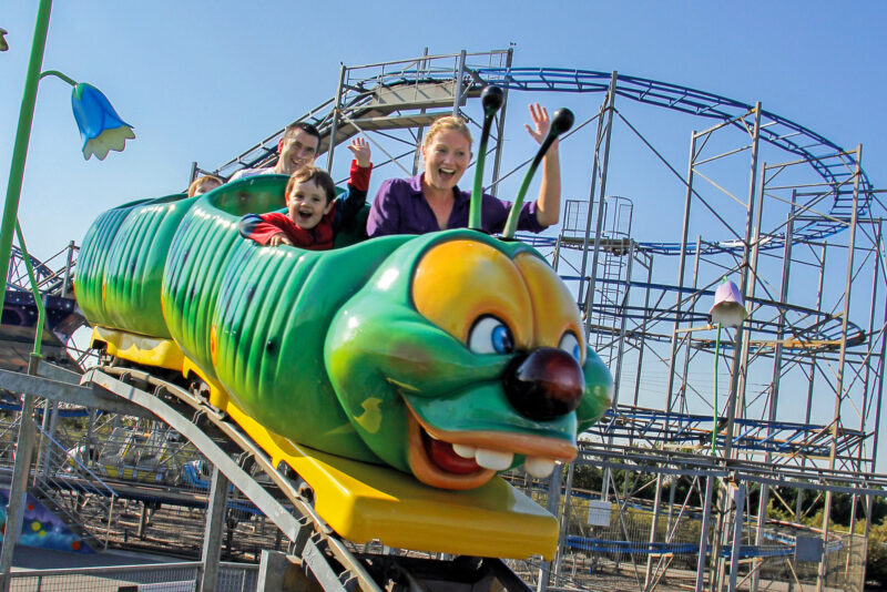 Young family riding the Coaster at The Milky Way Adventure Park in North Devon – perfect for younger children and family fun