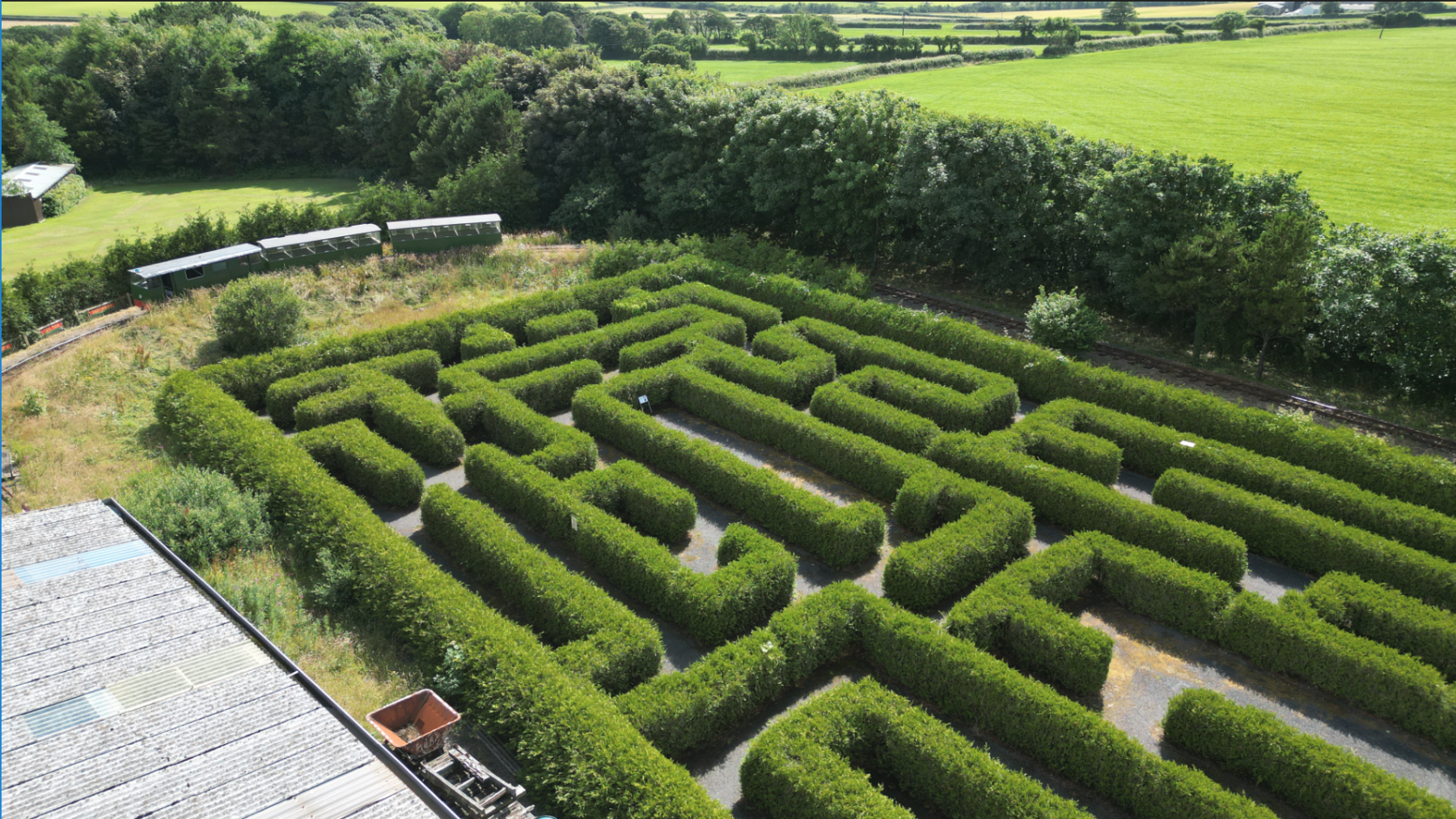 Aerial view of the outdoor maze at The Milky Way Adventure Park in North Devon – family-friendly hedge maze surrounded by countryside