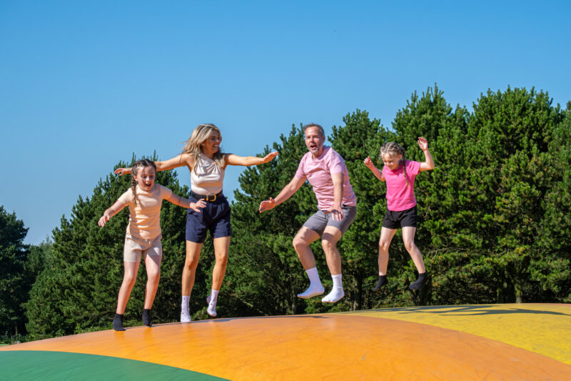 family on bouncing pillows
