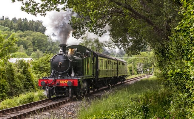 Train travelling across tracks in Devon