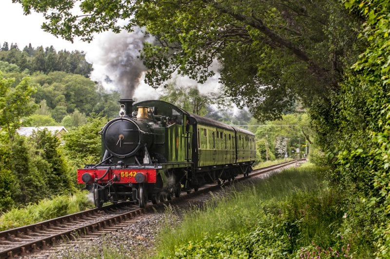 Train travelling across tracks in Devon