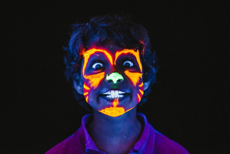 RAMM Child with glow in the dark face paint