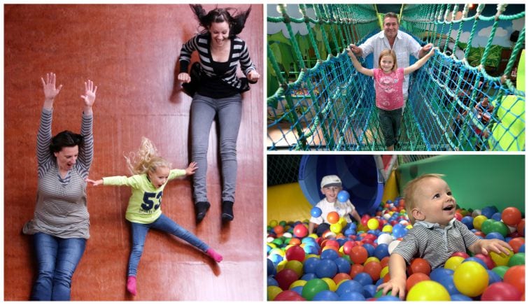 Children playing in soft play and on demon drops