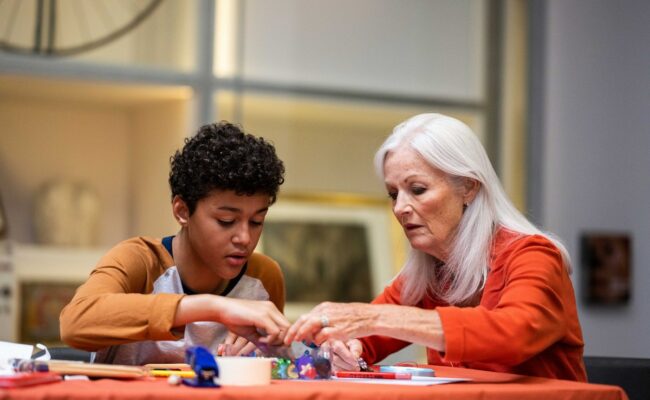 A woman and a young boy at a making workshop