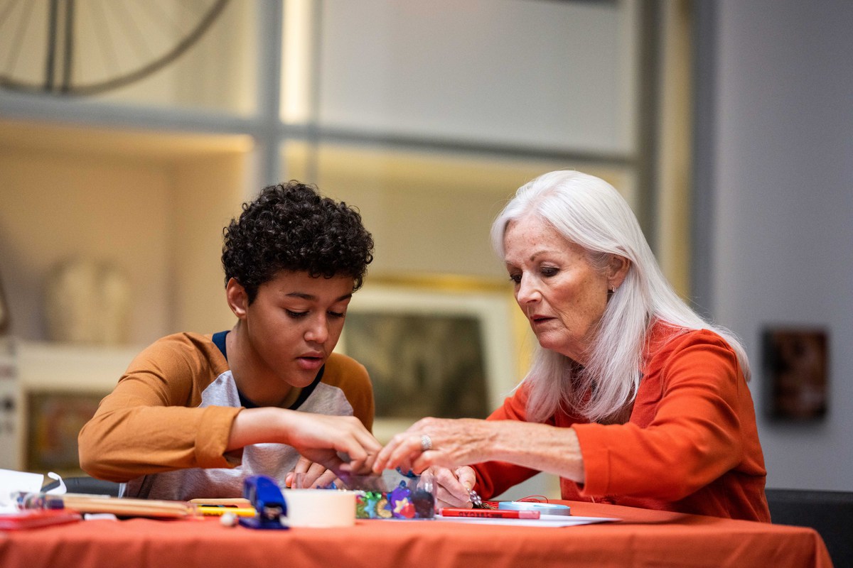 A woman and a young boy at a making workshop