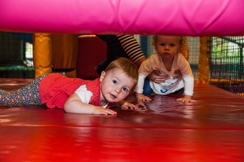 Children playing in soft play area